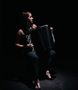 woman playing accordion